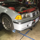 Raiding the E36 track car for a transmission at the last minute.